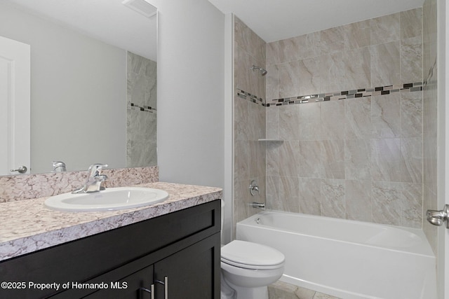 full bathroom with visible vents, vanity, toilet, and shower / bathtub combination