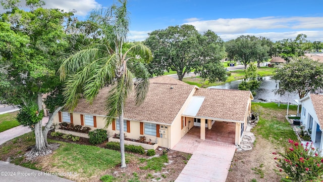 birds eye view of property featuring a water view