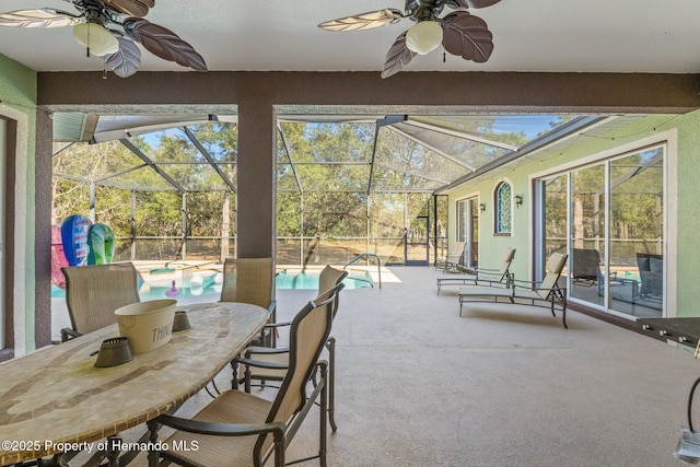 view of patio featuring a lanai and an outdoor pool