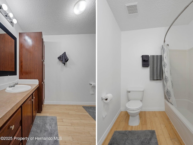 full bathroom featuring toilet, wood finished floors, visible vents, and shower / bath combo
