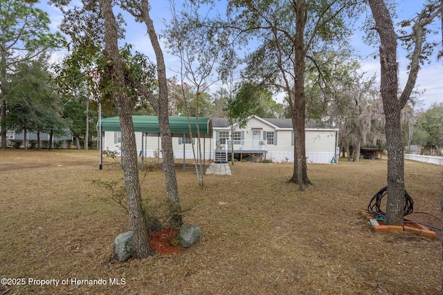 manufactured / mobile home featuring a deck