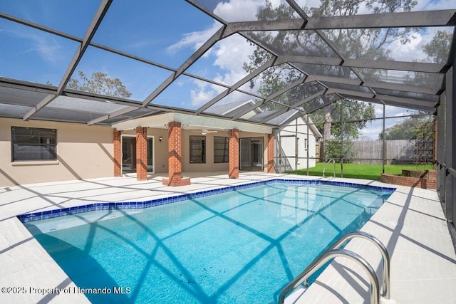 11080 Marquette St, Spring Hill, FL 34609 - pool with a patio area, a lanai, fence, and ceiling fan