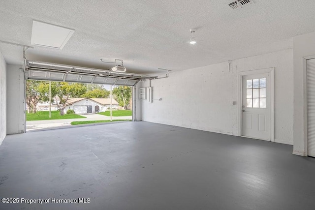11080 Marquette St, Spring Hill, FL 34609 - garage with visible vents and a garage door opener