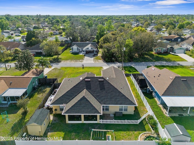 1018 Stratton Ave, Spring Hill, FL 34609 - drone / aerial view with a residential view