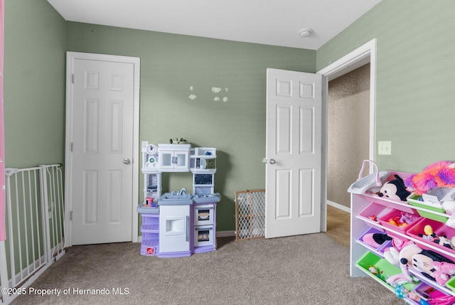 1018 Stratton Ave, Spring Hill, FL 34609 - recreation room featuring carpet