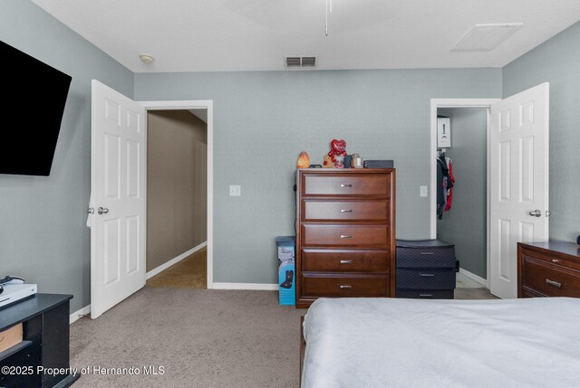 1018 Stratton Ave, Spring Hill, FL 34609 - carpeted bedroom with baseboards and visible vents