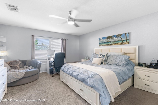 1018 Stratton Ave, Spring Hill, FL 34609 - bedroom with visible vents, a ceiling fan, and light carpet