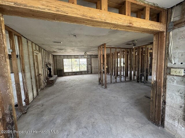 misc room with concrete flooring