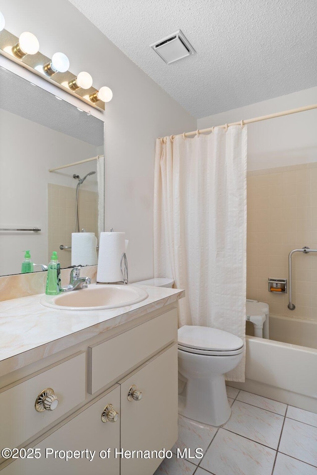 full bath with visible vents, tile patterned flooring, shower / tub combo, vanity, and toilet