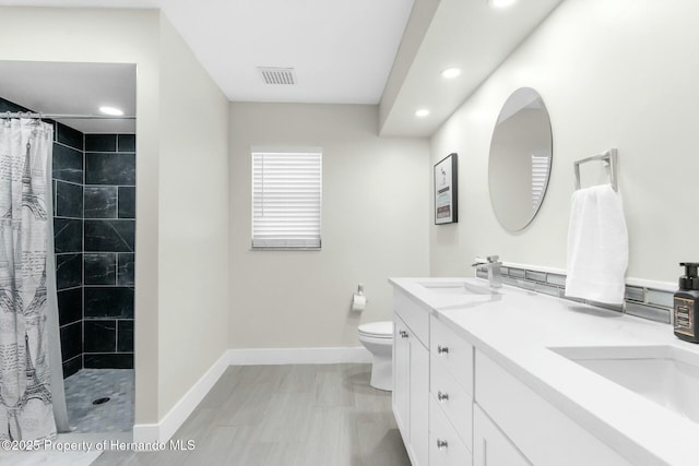 1156 Battersea Ave, Spring Hill, FL 34609 - full bath with a tile shower, visible vents, toilet, and a sink