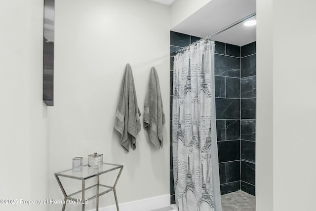 1156 Battersea Ave, Spring Hill, FL 34609 - full bathroom with baseboards and tiled shower