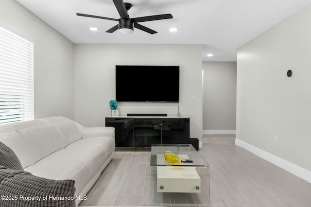 1156 Battersea Ave, Spring Hill, FL 34609 - living room featuring baseboards, ceiling fan, and recessed lighting