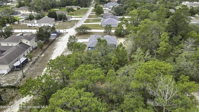 aerial overview of property's location with nearby suburban area