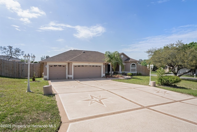 ranch-style house featuring a garage, a front lawn, concrete driveway, and fence