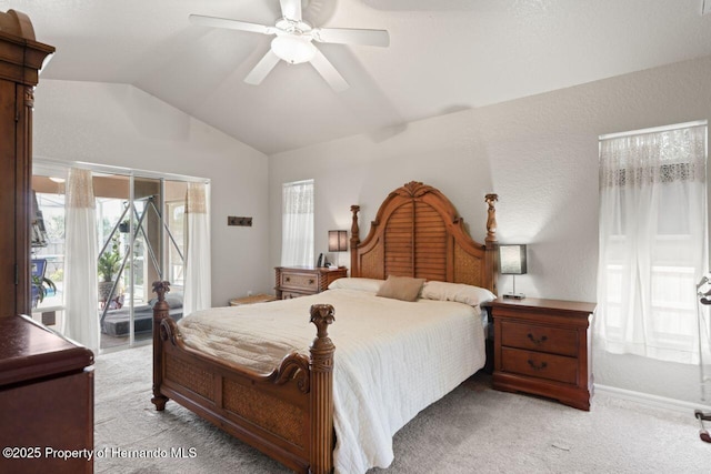 bedroom with vaulted ceiling, baseboards, access to outside, a ceiling fan, and light carpet