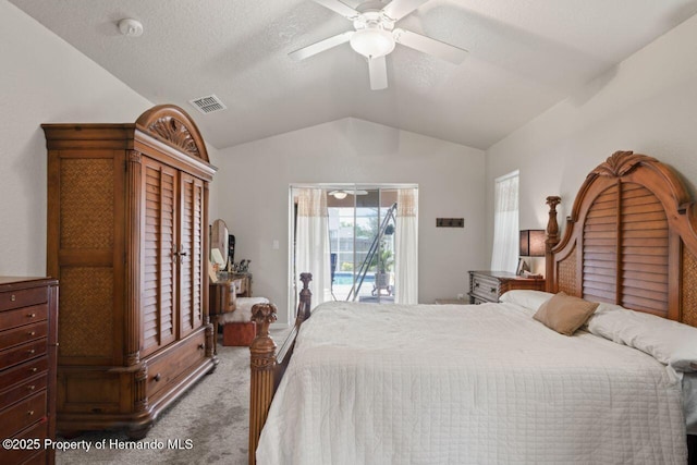 bedroom featuring carpet flooring, visible vents, ceiling fan, lofted ceiling, and access to exterior