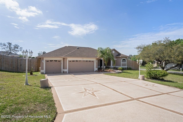 ranch-style house with a garage, a front lawn, concrete driveway, and fence