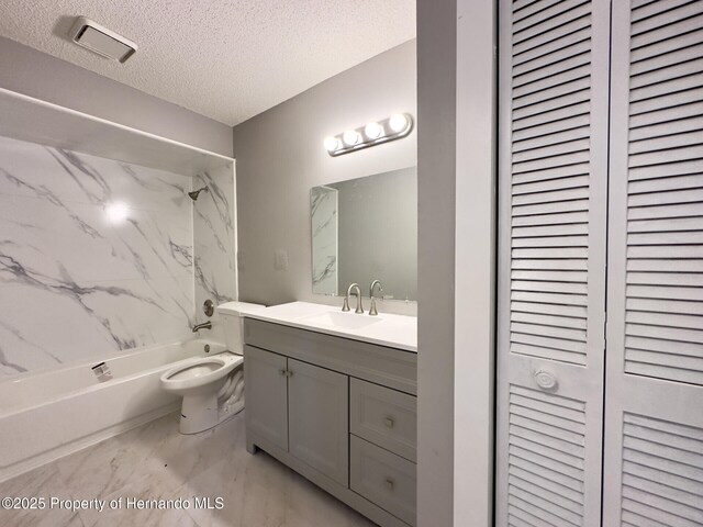 2253 Estill Ave, Spring Hill, FL 34609 - bathroom with a closet, toilet, bathing tub / shower combination, a textured ceiling, and vanity
