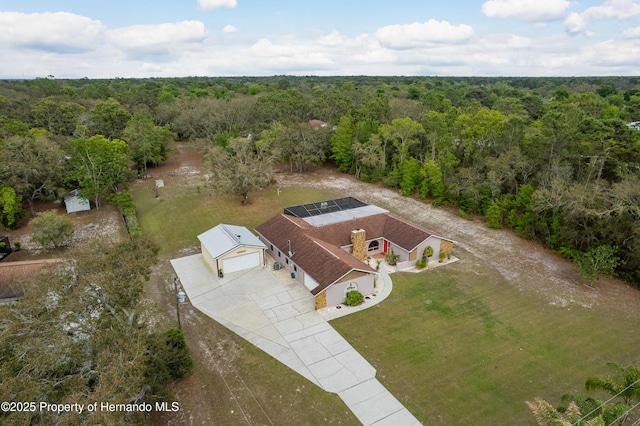 18216 Monteverde Dr, Shady Hills, FL 34610 - aerial view featuring a forest view