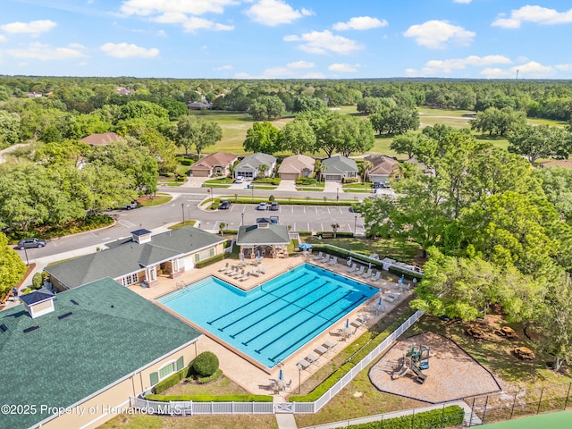 bird's eye view featuring a view of trees