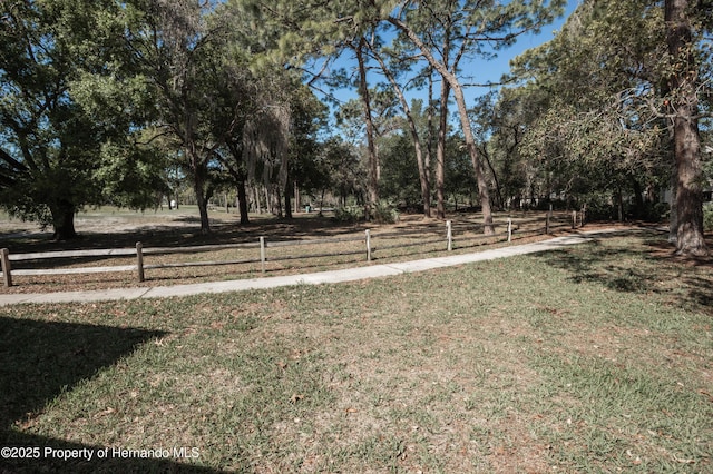 view of yard featuring fence