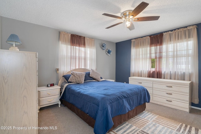 9414 Northcliffe Blvd, Spring Hill, FL 34606 - bedroom featuring a textured ceiling, a ceiling fan, and carpet