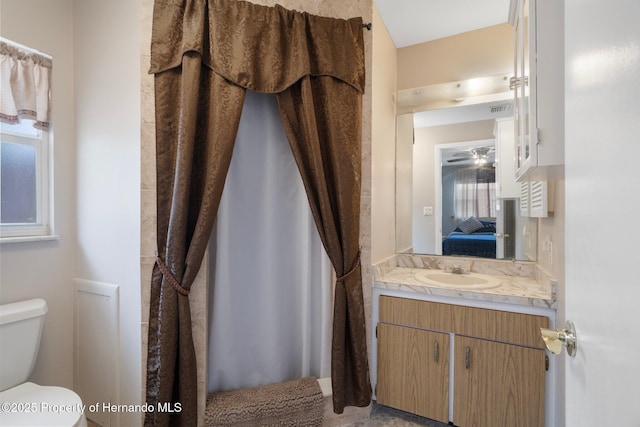 9414 Northcliffe Blvd, Spring Hill, FL 34606 - ensuite bathroom with visible vents, toilet, ensuite bath, and vanity