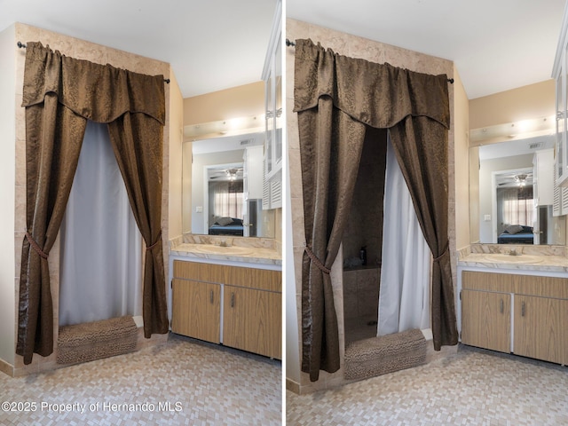 9414 Northcliffe Blvd, Spring Hill, FL 34606 - ensuite bathroom with ensuite bathroom, a ceiling fan, and vanity
