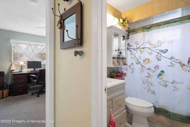 9414 Northcliffe Blvd, Spring Hill, FL 34606 - full bath with a shower with shower curtain, vanity, a textured ceiling, and toilet
