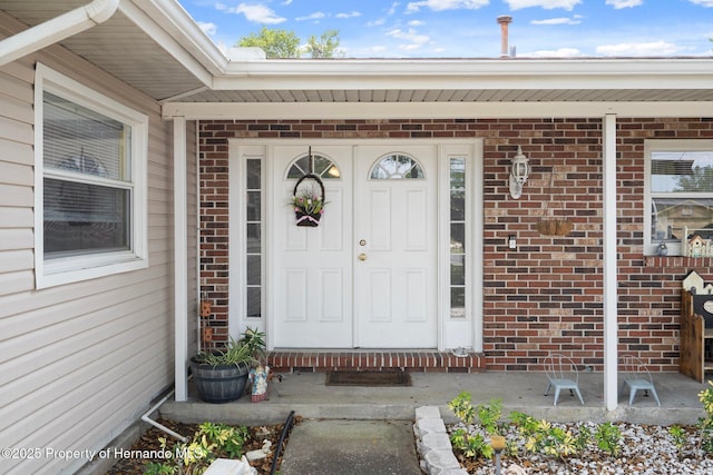 9414 Northcliffe Blvd, Spring Hill, FL 34606 - doorway to property featuring brick siding