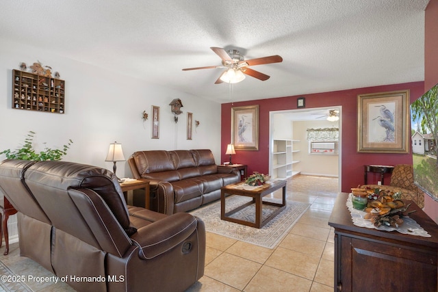 9414 Northcliffe Blvd, Spring Hill, FL 34606 - living room with a textured ceiling, light tile patterned floors, and a ceiling fan