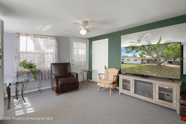 9414 Northcliffe Blvd, Spring Hill, FL 34606 - sitting room featuring ceiling fan, baseboards, and carpet flooring