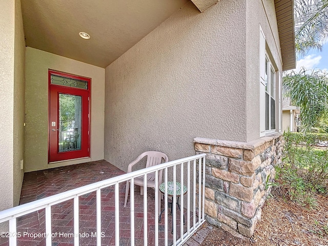 5401 Cappleman Loop, Brooksville, FL 34601 - property entrance with stucco siding and stone siding