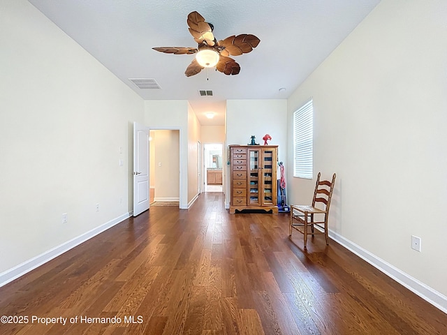5401 Cappleman Loop, Brooksville, FL 34601 - sitting room with a ceiling fan, dark wood-type flooring, and baseboards