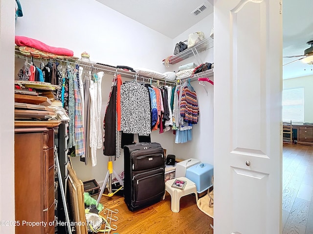 5401 Cappleman Loop, Brooksville, FL 34601 - spacious closet with wood finished floors and a ceiling fan