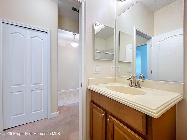 5401 Cappleman Loop, Brooksville, FL 34601 - bathroom with vanity and baseboards