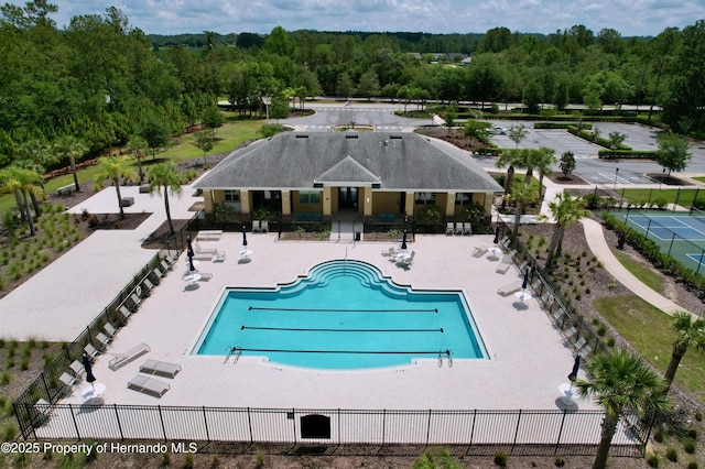 5401 Cappleman Loop, Brooksville, FL 34601 - community pool with fence and a wooded view