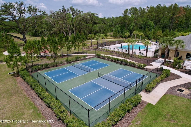 5401 Cappleman Loop, Brooksville, FL 34601 - view of tennis court featuring fence
