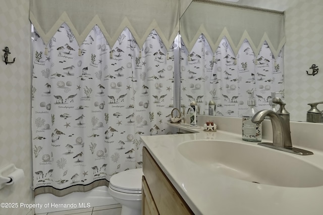 10109 Holly Berry Dr, Weeki Wachee, FL 34613 - bathroom featuring toilet, shower / bathtub combination with curtain, vanity, and wallpapered walls