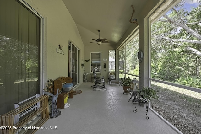 10109 Holly Berry Dr, Weeki Wachee, FL 34613 - sunroom / solarium featuring ceiling fan and plenty of natural light
