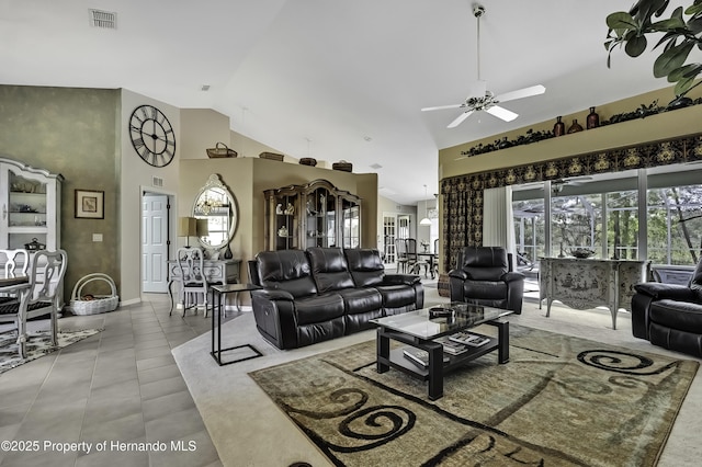17364 Mediterranean Cir, Brooksville, FL 34614 - living room featuring high vaulted ceiling, a ceiling fan, and visible vents