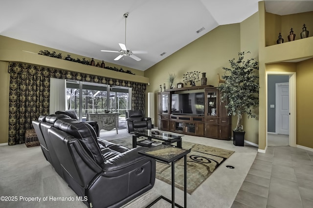 17364 Mediterranean Cir, Brooksville, FL 34614 - living area with high vaulted ceiling, ceiling fan, baseboards, and visible vents