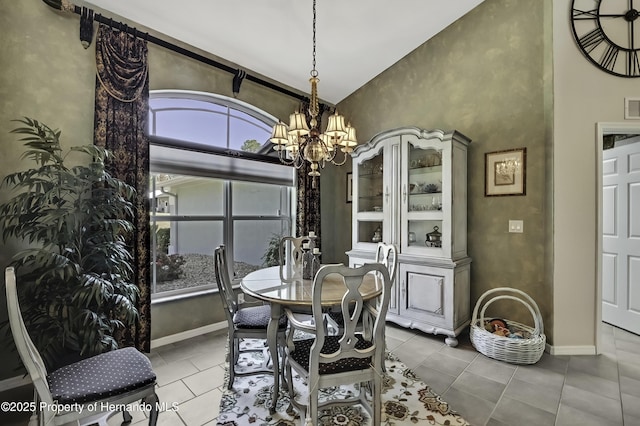 17364 Mediterranean Cir, Brooksville, FL 34614 - dining room with visible vents, baseboards, an inviting chandelier, and tile patterned flooring
