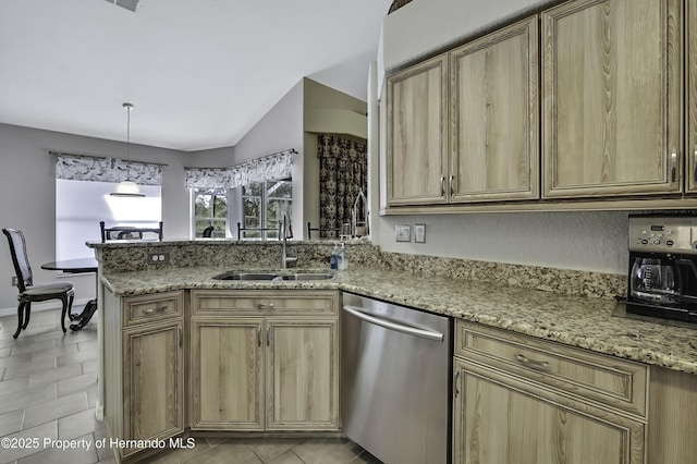 17364 Mediterranean Cir, Brooksville, FL 34614 - kitchen featuring a sink, light brown cabinetry, a peninsula, stainless steel dishwasher, and light stone counters