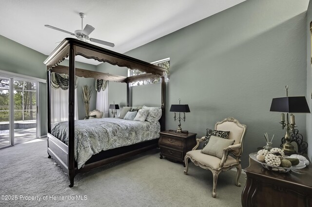 17364 Mediterranean Cir, Brooksville, FL 34614 - carpeted bedroom featuring access to outside and a ceiling fan