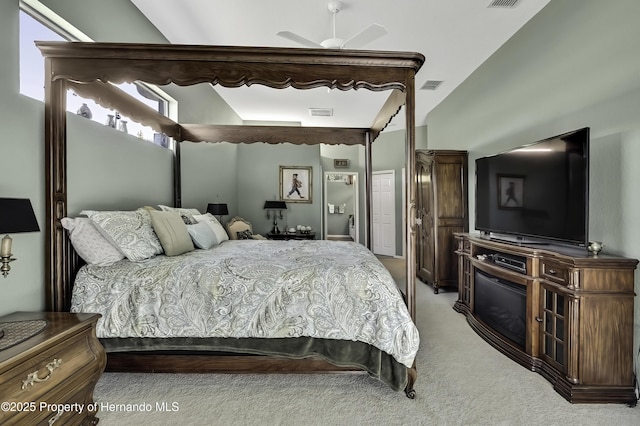 17364 Mediterranean Cir, Brooksville, FL 34614 - bedroom with visible vents, ceiling fan, and light colored carpet