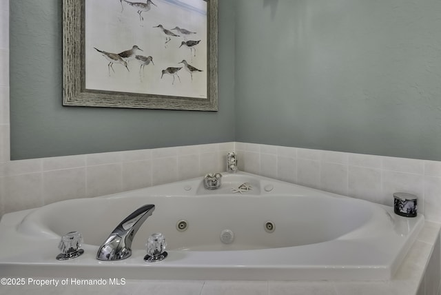 17364 Mediterranean Cir, Brooksville, FL 34614 - bathroom with a whirlpool tub