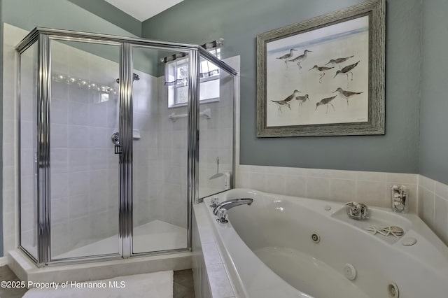 17364 Mediterranean Cir, Brooksville, FL 34614 - full bath with a shower stall and a jetted tub