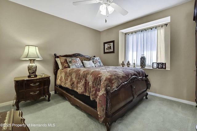 17364 Mediterranean Cir, Brooksville, FL 34614 - carpeted bedroom featuring baseboards and a ceiling fan