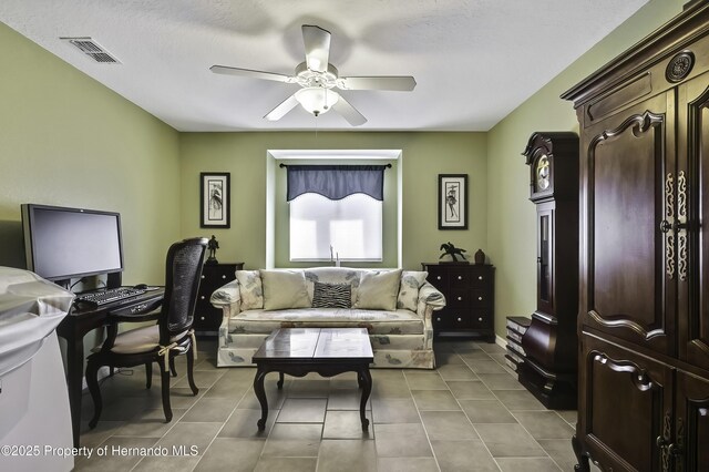 17364 Mediterranean Cir, Brooksville, FL 34614 - office area featuring visible vents, ceiling fan, and tile patterned flooring